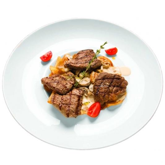 Медальоны из телятины с белыми грибами и картофельными дольками Медальоны из телятины с белыми грибами и картофельными дольками